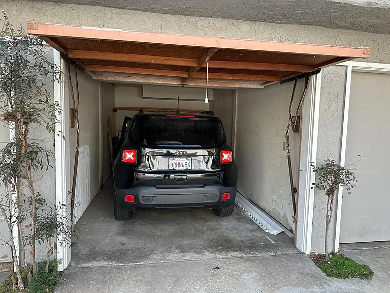 The garage for this 2-bedroom unit