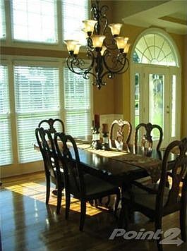 Formal Dining Room with Wainscotting, Paladin Windows, Plantation Blinds - perfect for family dinner