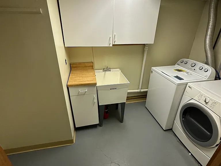Laundry room with utility sink.