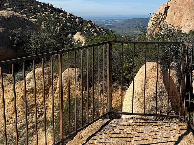 The view of the mountains and the lake from the right side of the house.