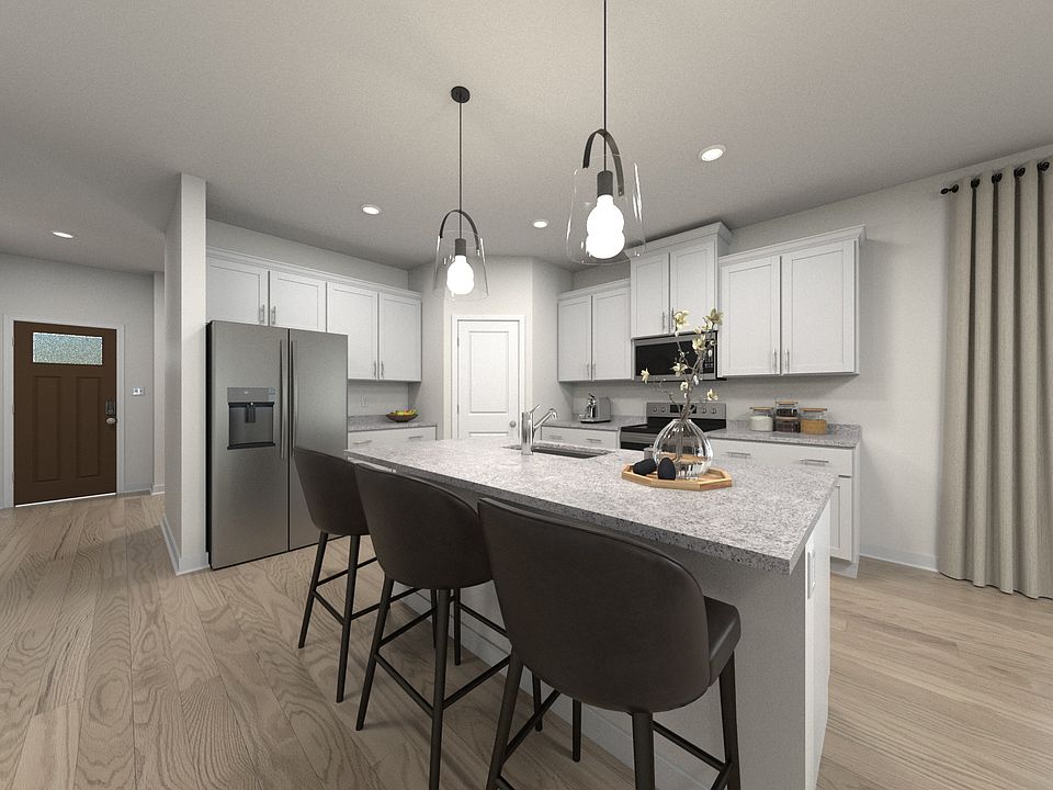 Kitchen in the Manchester floorplan at Meritage Homes community.
