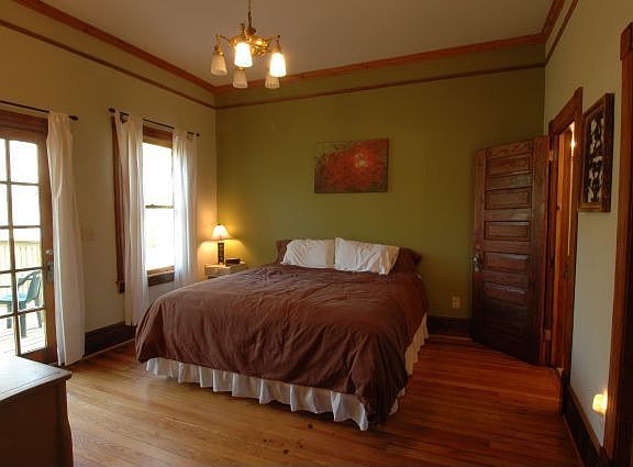 Master Bedroom has French doors which open up to deck overlooking backyard