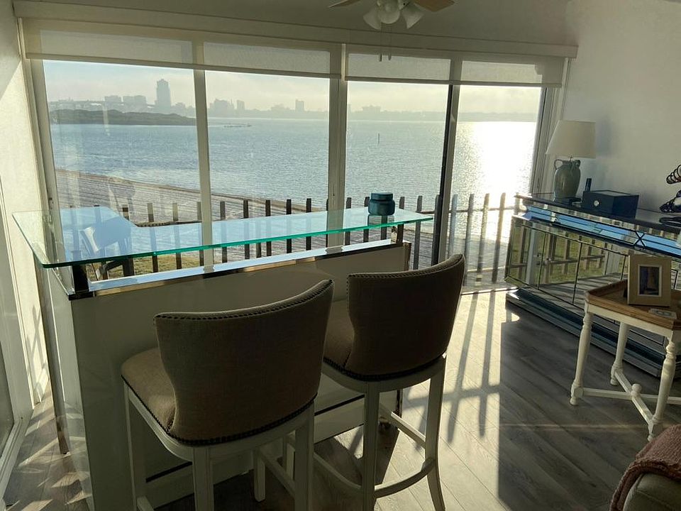 Bar looking out. Relax with friends over a cocktail taking in this scene!