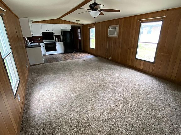 Living area with newly remodeled kitchen