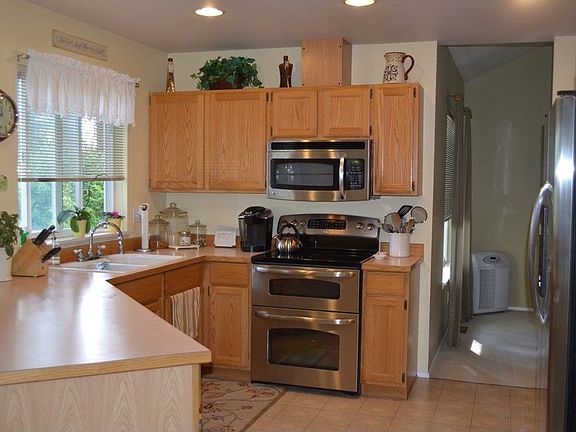 3rd image of 11012 Lobelia Ave NW