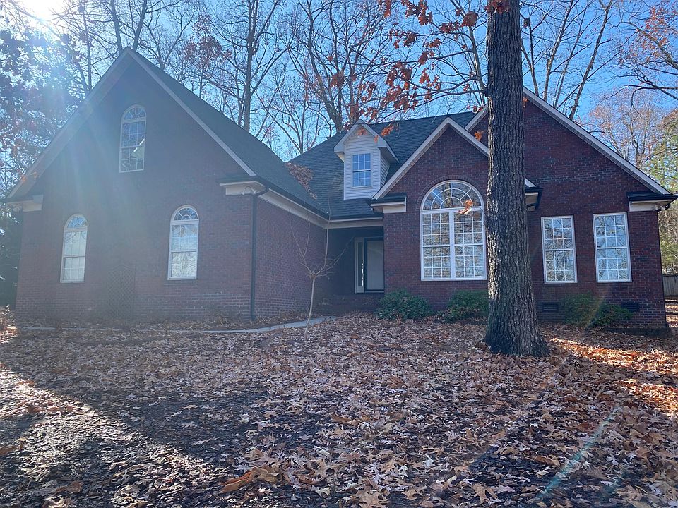 ranch house with one room upstairs