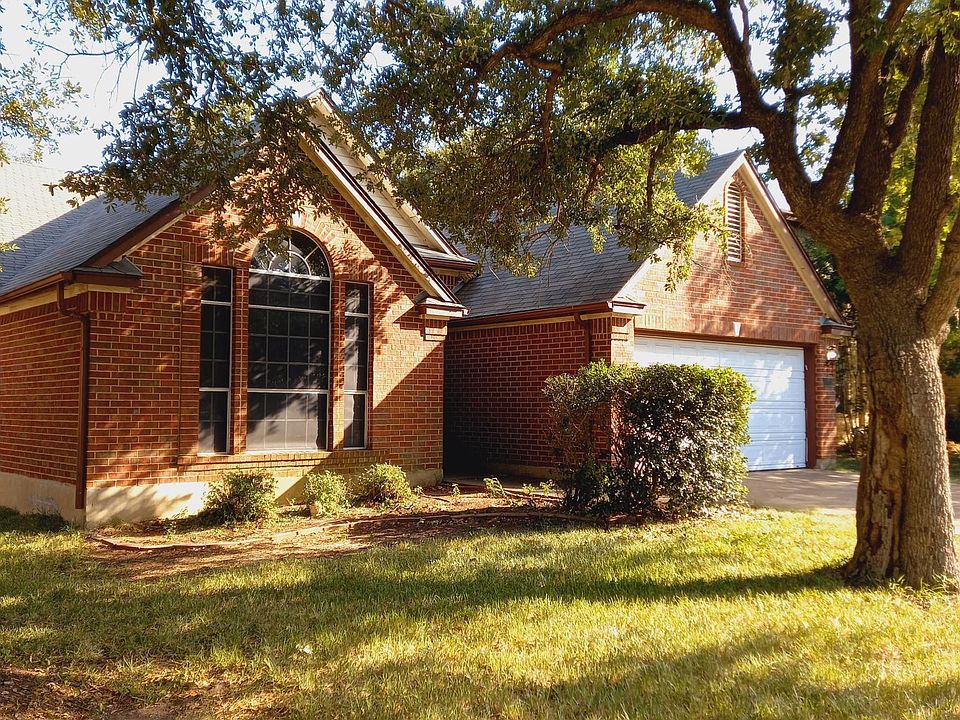 Charming curb appeal with mature trees