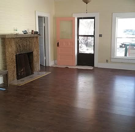 Living room, front door, fire place