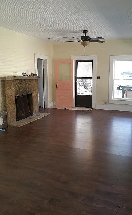 Living room, front door, fire place