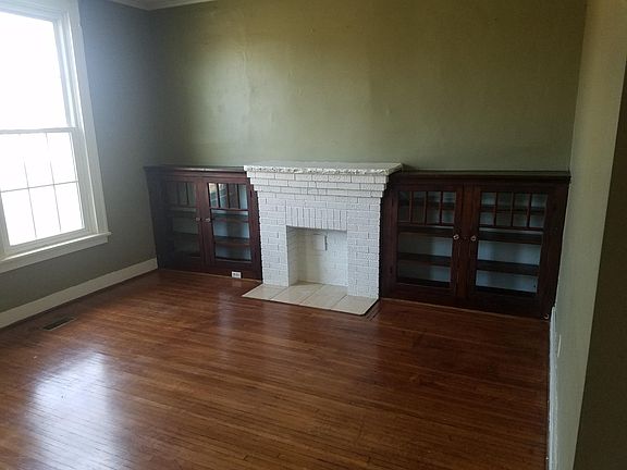 living room with built in cabinets