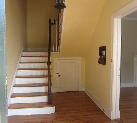 Spacious foyer, with hardwood floors and fresh paint