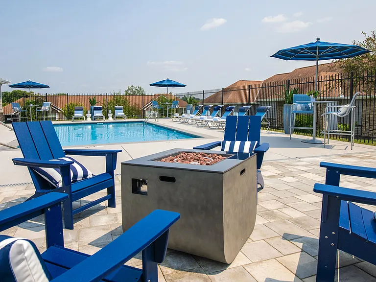 Gather around our inviting poolside fire pits, where residents come together for heartwarming conversations and tranquil moments day and night.