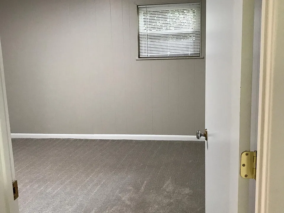 Bedroom 1 with new carpet and paint