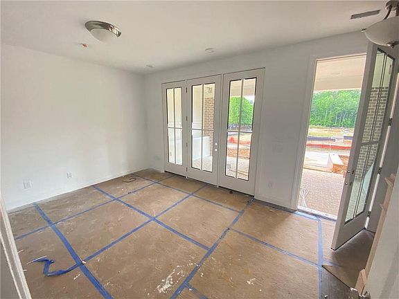 Media Room looking at fenced in courtyard