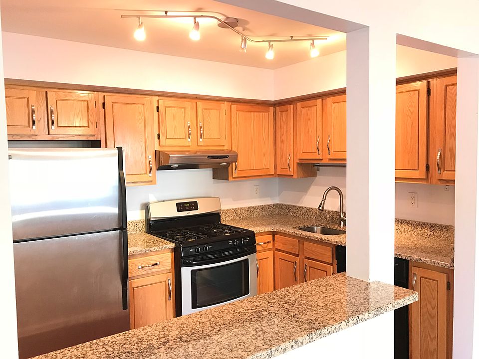 Completely renovated kitchen with stainless steel appliances and new granite countertops