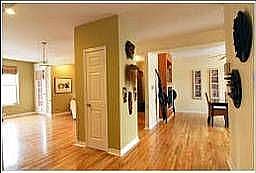 foyer w/coat closet and view to dining room and living room
