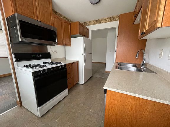 Galley kitchen, lots of storage, large pantry