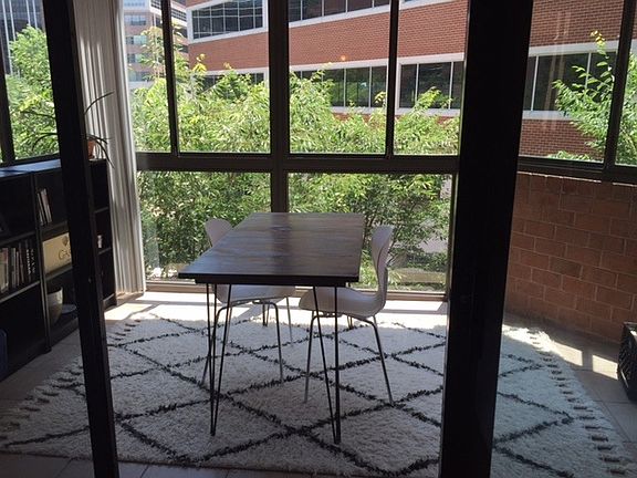 Enclosed patio is ideal as a dining area, office or sitting