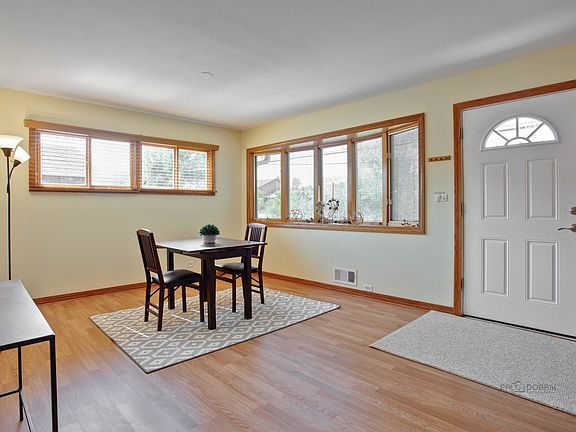 Front door shown as well as bay window with lots of light