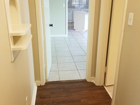 Hallway leading to kitchen