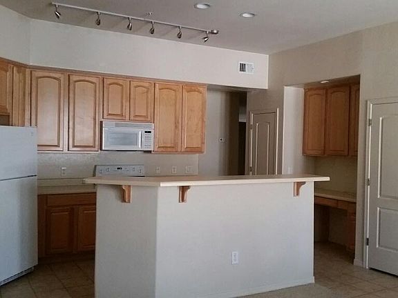 4th image of 11000 N 77th Pl Unit 1073
