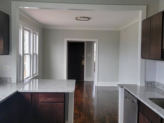 Kitchen looking thru to the front door