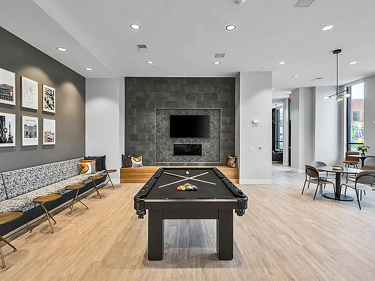 Community Lounge Featuring a Pool Table