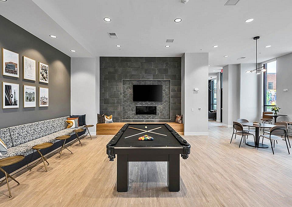 Community Lounge Featuring a Pool Table
