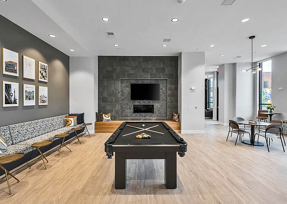 Community Lounge Featuring a Pool Table