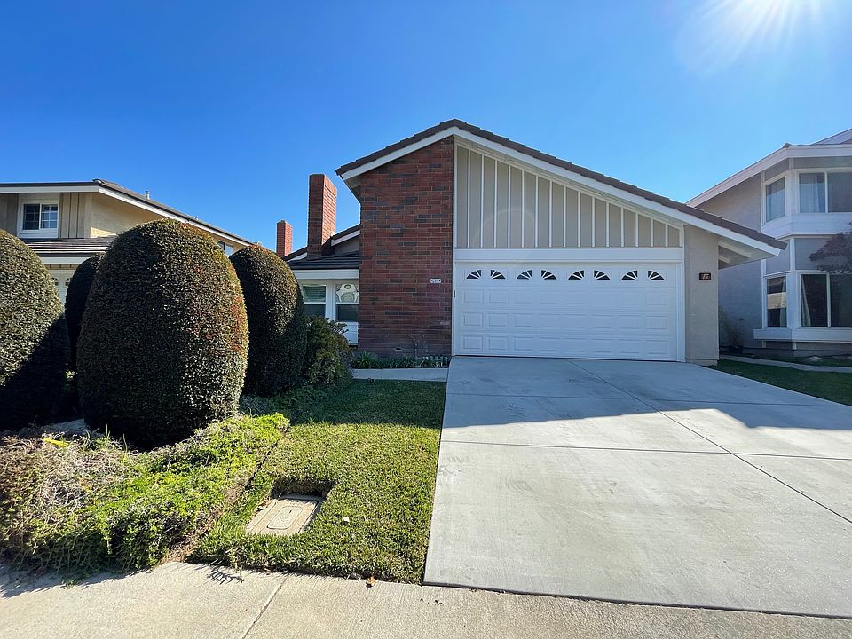 Front of the house driveway and 2 car garage attached