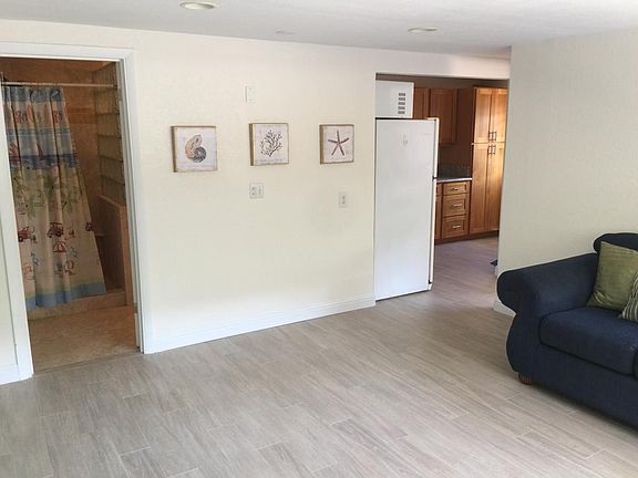 Living area facing bathroom.