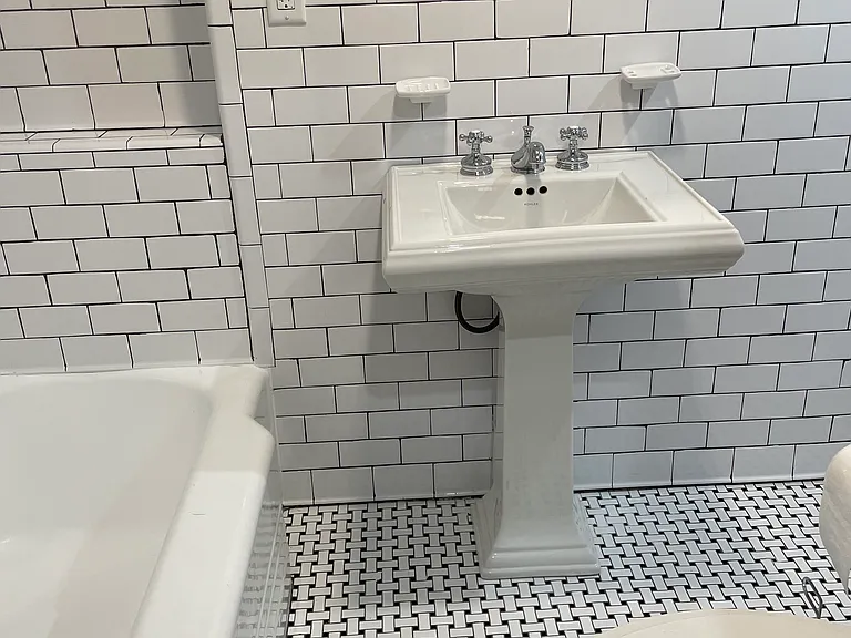 Bathroom with vintage cast iron tub