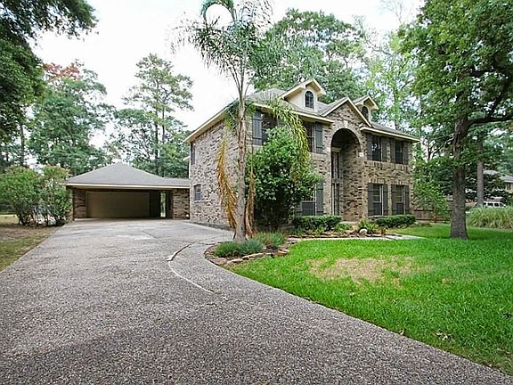 Long Driveway, Detached 2 car Garage.