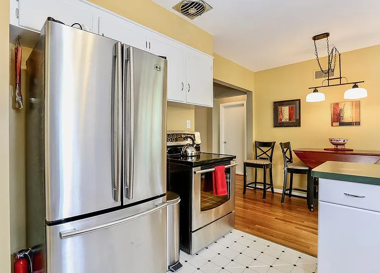 Newer appliances spotlessly clean.