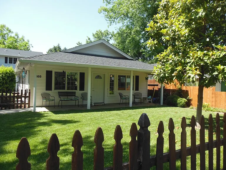 Front of house w/great porch & yard!