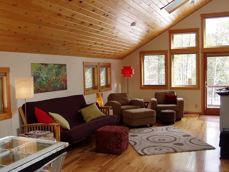 South side door to coffee deck. These are not the current furnishings if rented furnished.