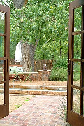 At the center of this peaceful terrace â?? accessed via French doors in both the living room and the