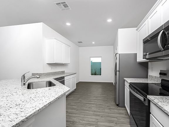 Chef-ready kitchen with a breakfast nook
