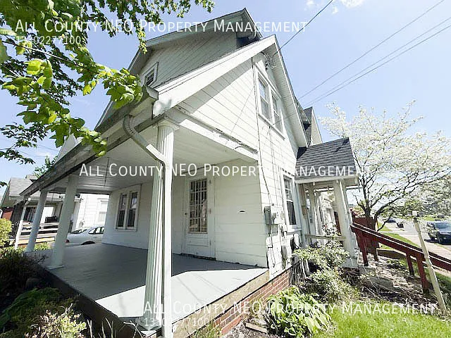 Charming 3 Bedroom Home with Huge Front Porch & Cozy Sunroom! — Photo 2