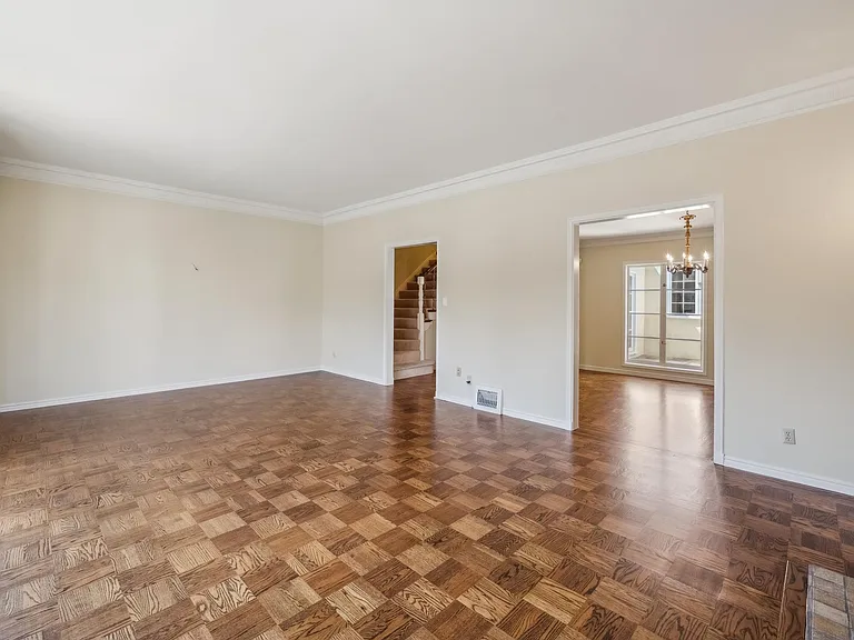 Living room looking into adjacent dining room