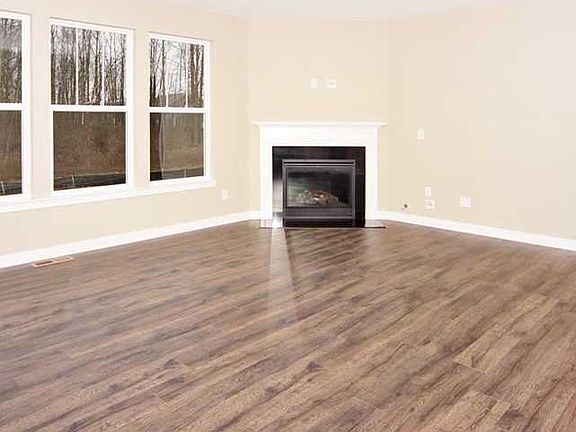 Model photo of same home. Please check construction stage of