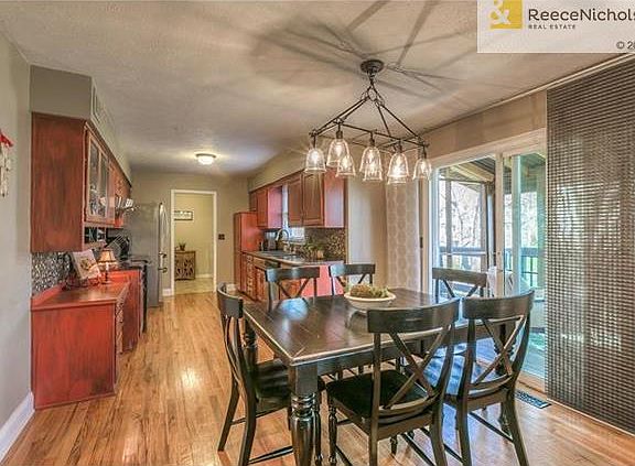 Enjoy casual dining in the breakfast room that opens to the screened porch.
