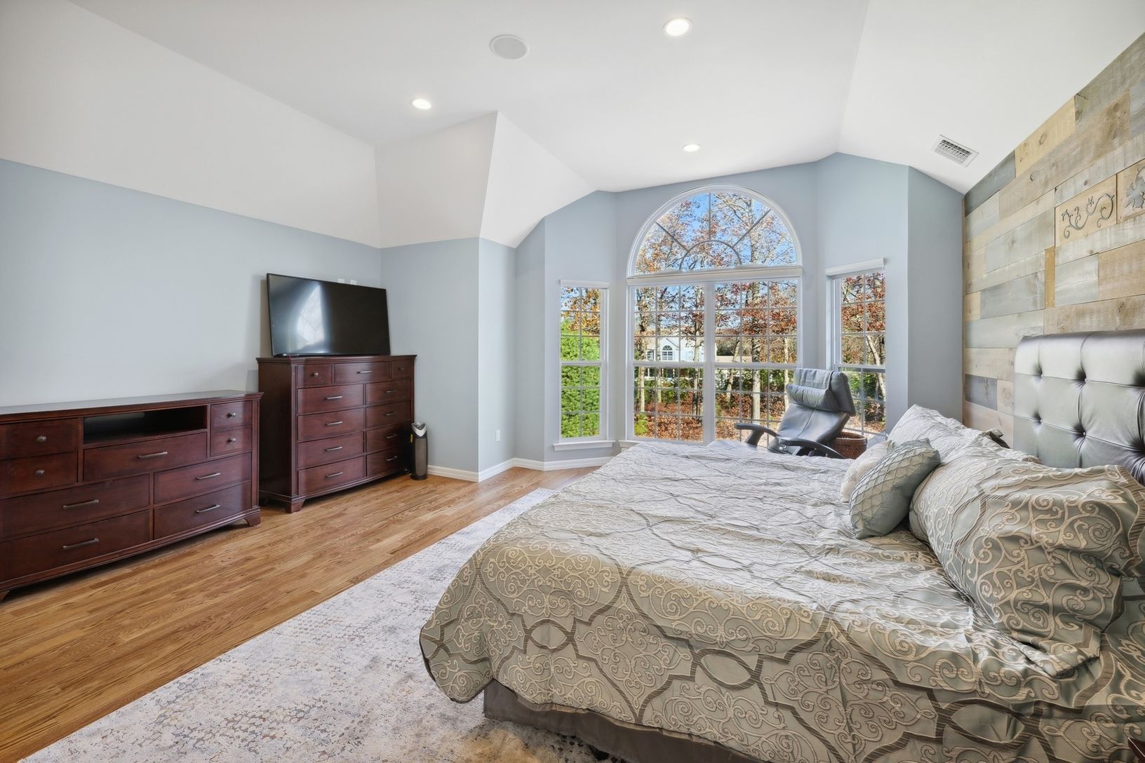  Primary Bedroom With Large Windows That Bring In Lots Of Light