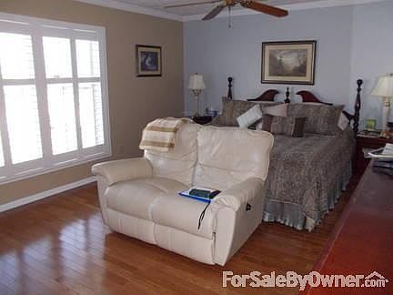 Front Living Room
						:
						Gas log fireplace with marble surround