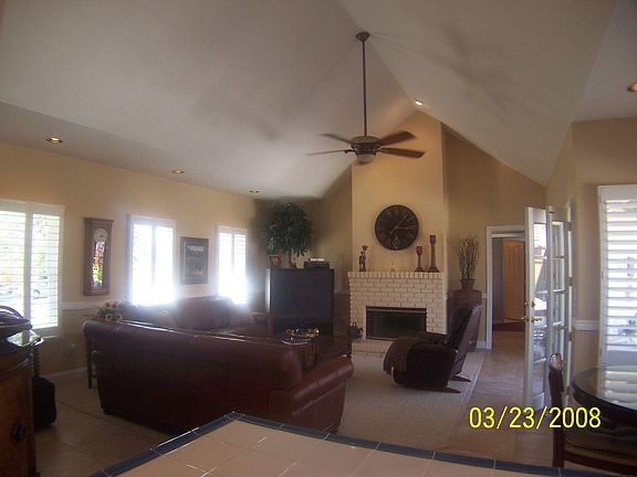 Spacious Family Room With Cathedral Celing and Fireplace