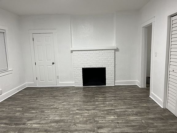 living room alternate view; 
fireplace decorative only