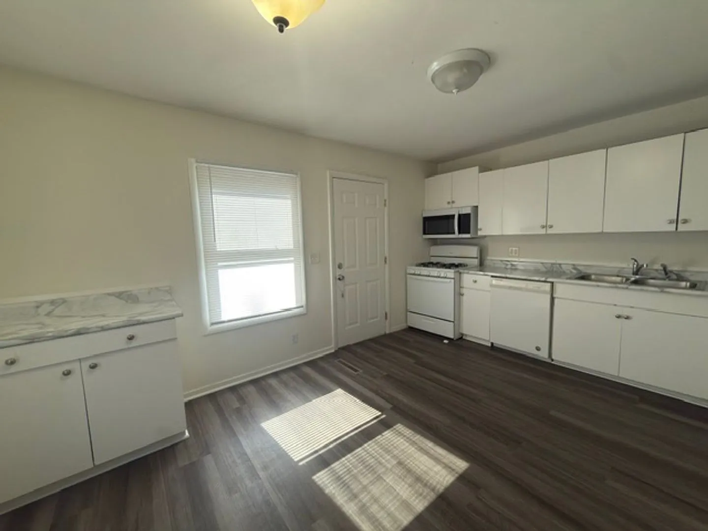 Spacious 3-Bedroom Home with Fully Fenced Private Yard & Detached Garage — Photo 3