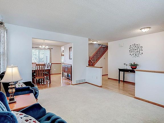 Foyer, living room and dining area