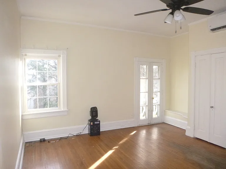 The Primary Bedroom features a Juliet Balcony.