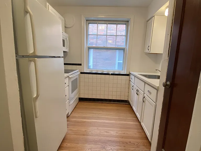 Kitchen with pantry space.